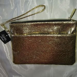 Brand new with tags gold coin purse.